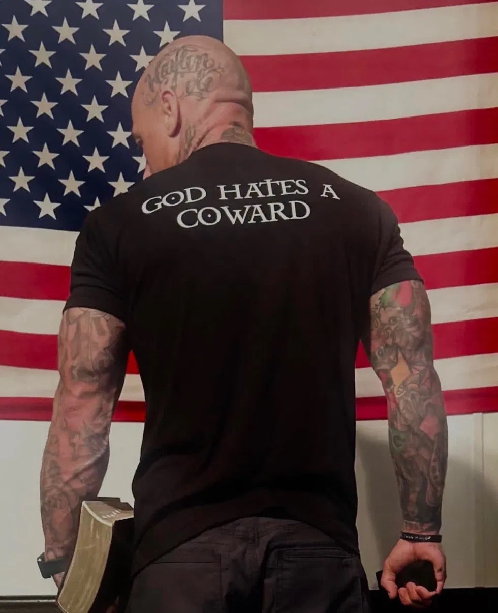 "God Hates A Coward" Tee — White Ink (back)